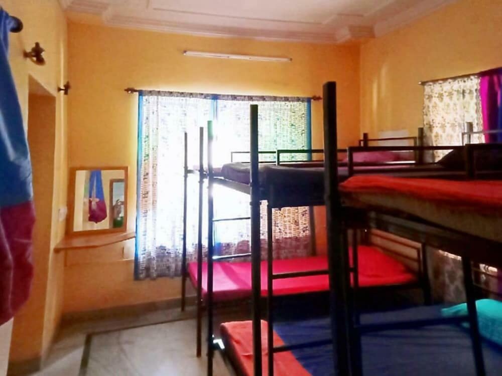 Cama en dormitorio compartido Blessing Hotel