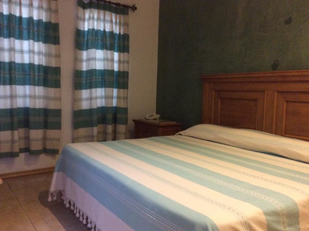 Кровать в общем номере Hotel Oaxaca Inn Centro