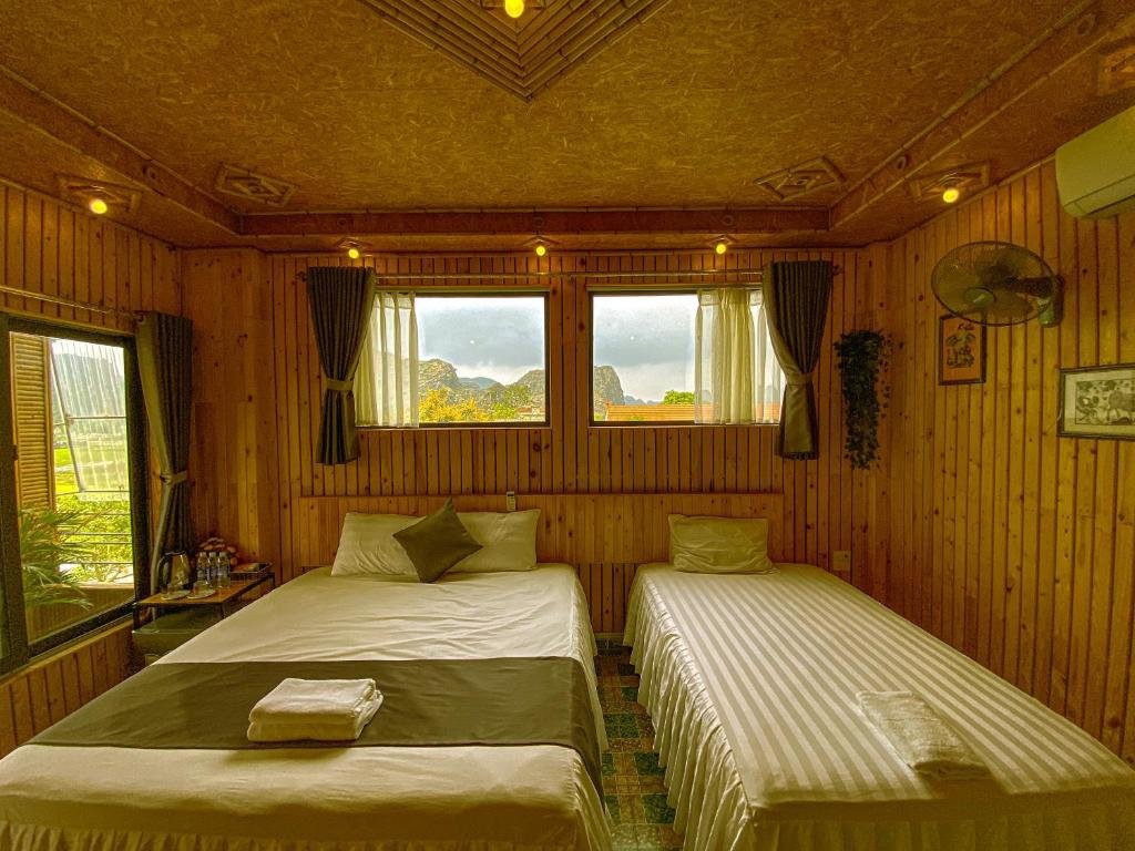 Deluxe triple chambre Hang Mua Homestay - Hostel