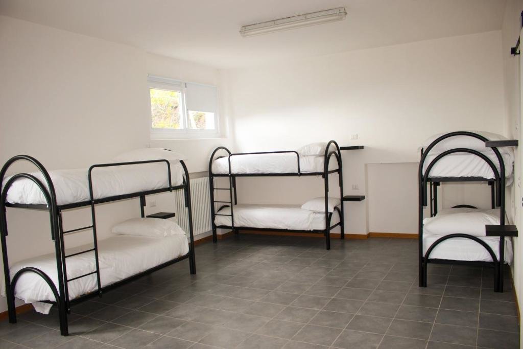 Cama en dormitorio compartido Indomita Alps Hostel