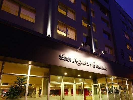 Кровать в общем номере San Agustin Exclusive Hotel