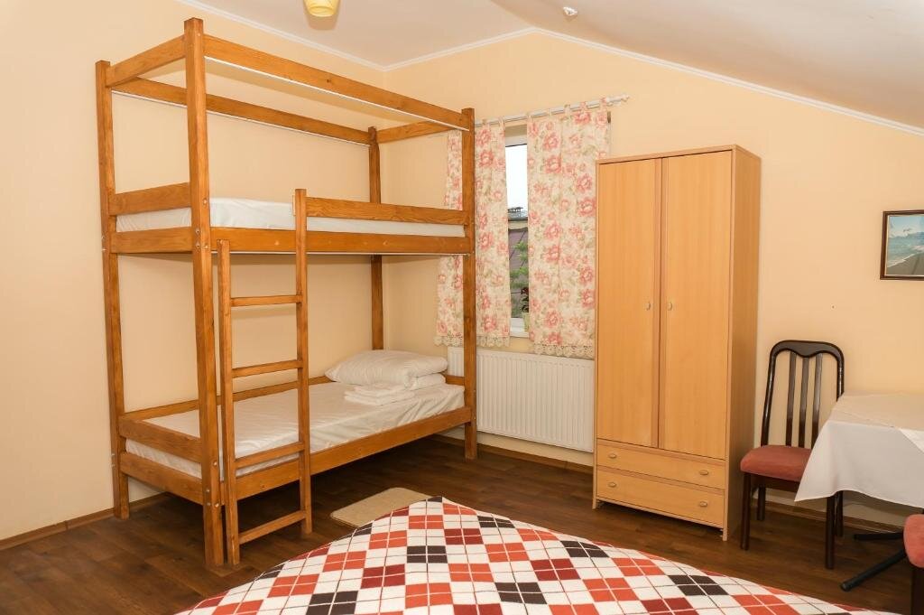Standard Quadruple room Hospoda Hostel