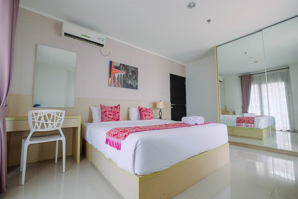 Habitación Estándar Cozy 2BR Apartment with Sofa Bed at Tamansari Semanggi