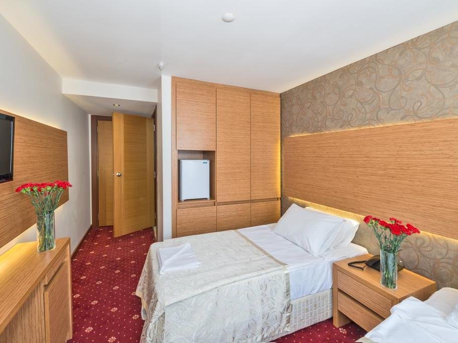Кровать в общем номере Erbazlar Hotel