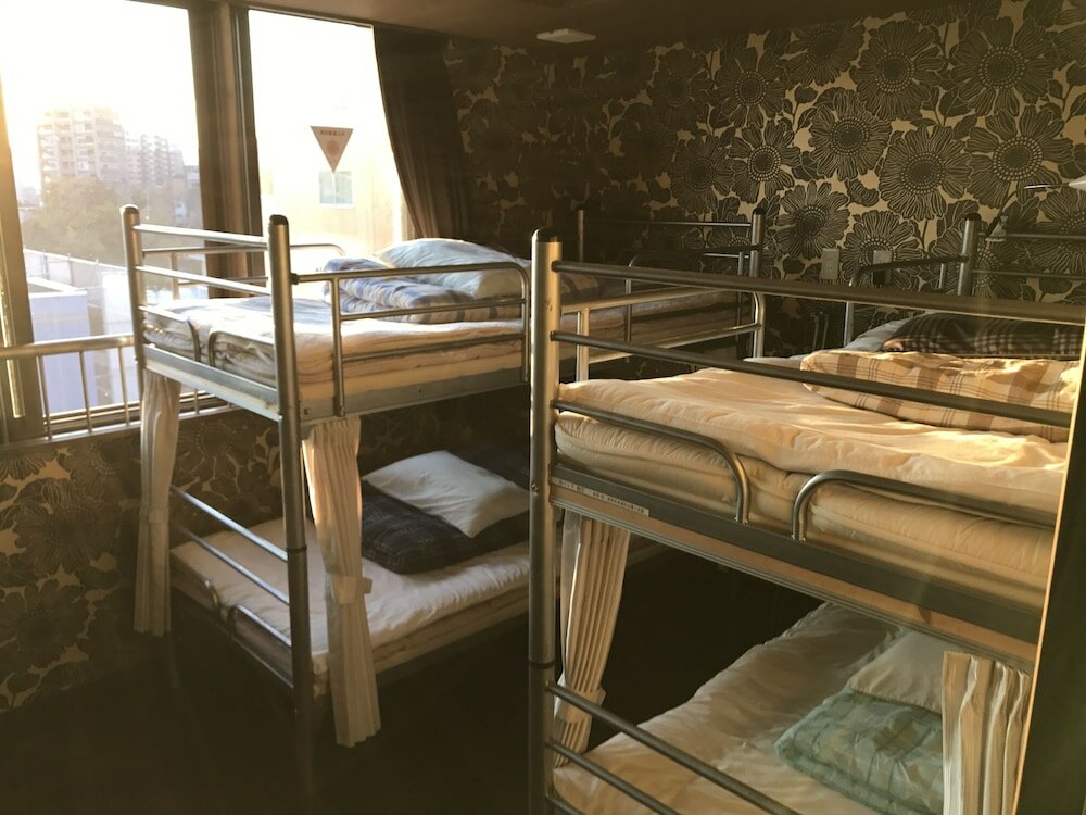 Cama en dormitorio compartido Guesthouse Tiga