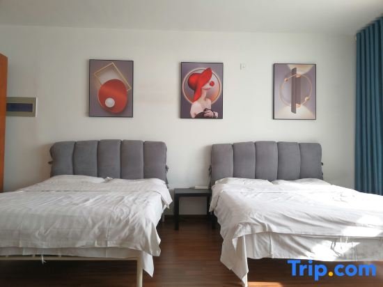 Cama en dormitorio compartido Xinshiji Hongyuan Apartment Hotel