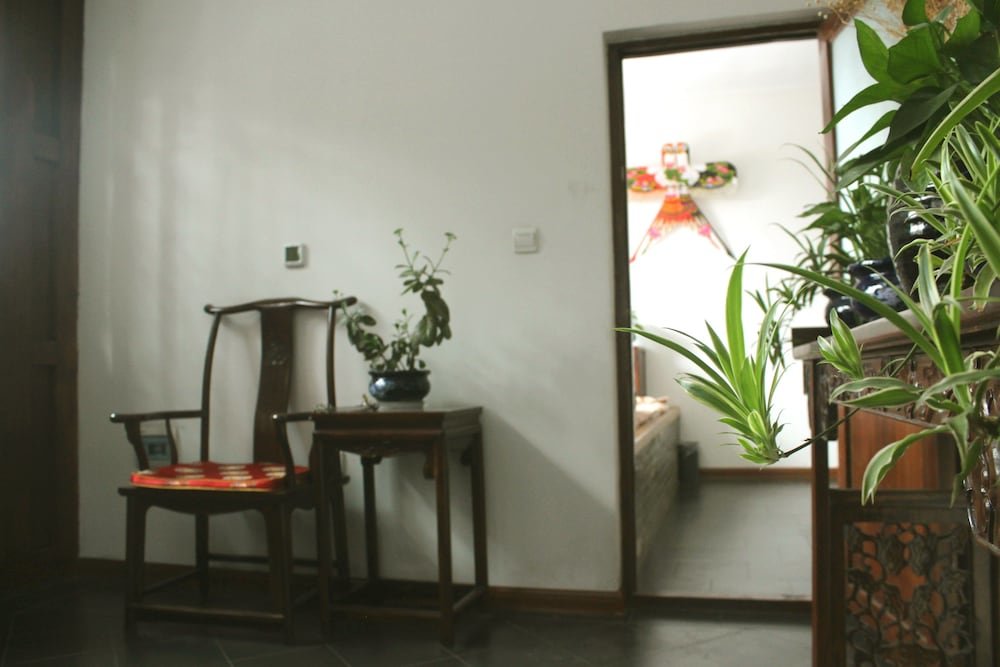 Suite familiare 2 camere con vista sul giardino City Wall Old House.Ji Residence Pingyao