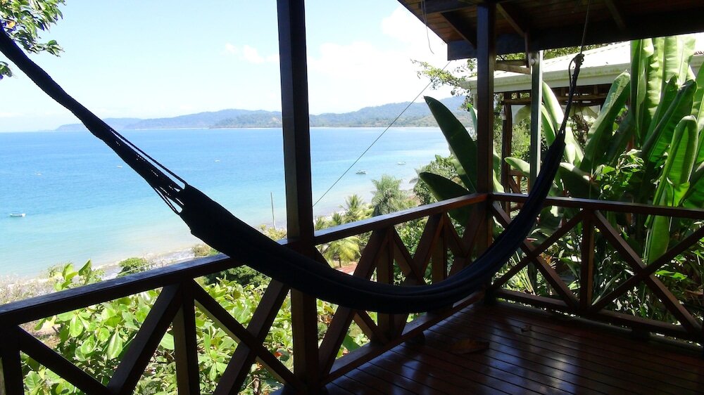 Standard Bungalow with balcony and with ocean view Las Cotingas Lodge