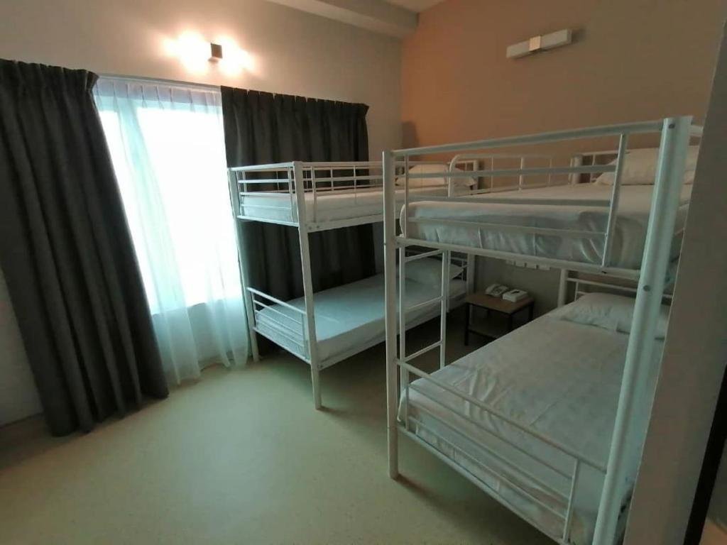 Cama en dormitorio compartido Serapi Verdure Hotel