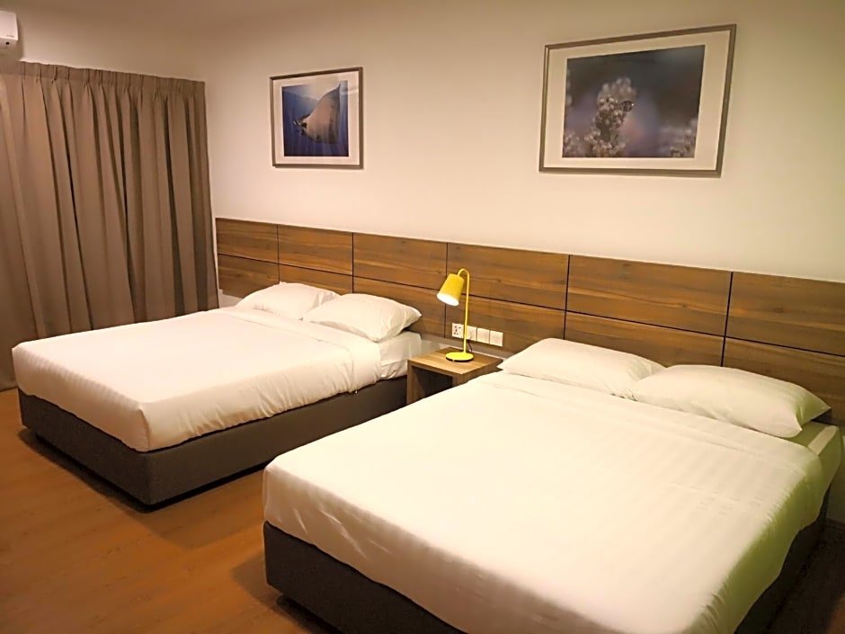 Deluxe quadruple chambre Aman Tioman Beach Resort