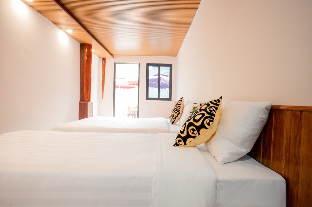 Standard Vierer Zimmer 1 Schlafzimmer Catba Papillon Garden Bungalow & Resort