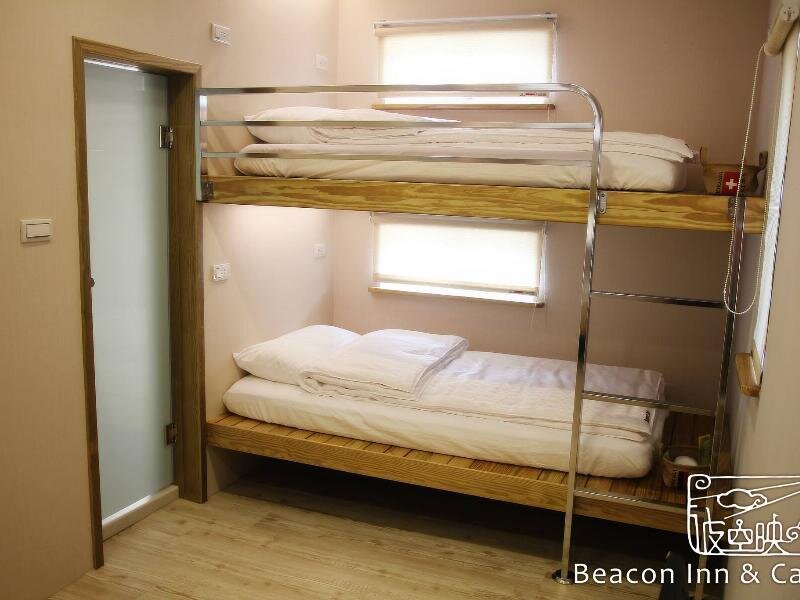 Bett im Wohnheim Beacon Inn