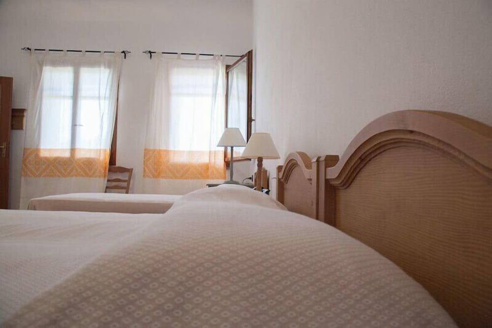 Standard Quadruple room Residence Hotel Monte Ricciu