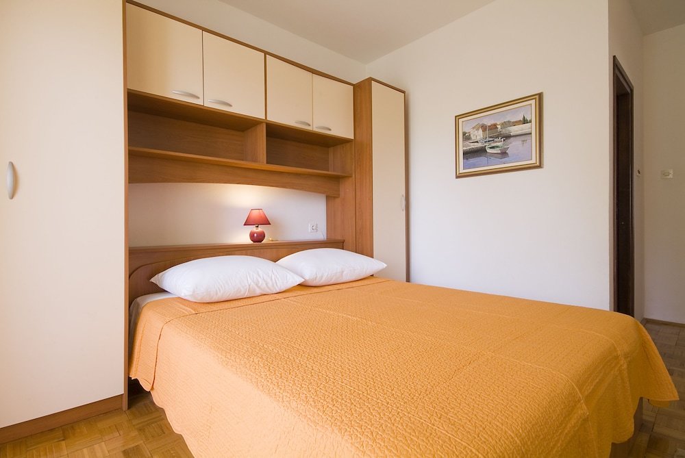 Bett im Wohnheim 6 Zimmer mit Meerblick Apartments Valentina-B