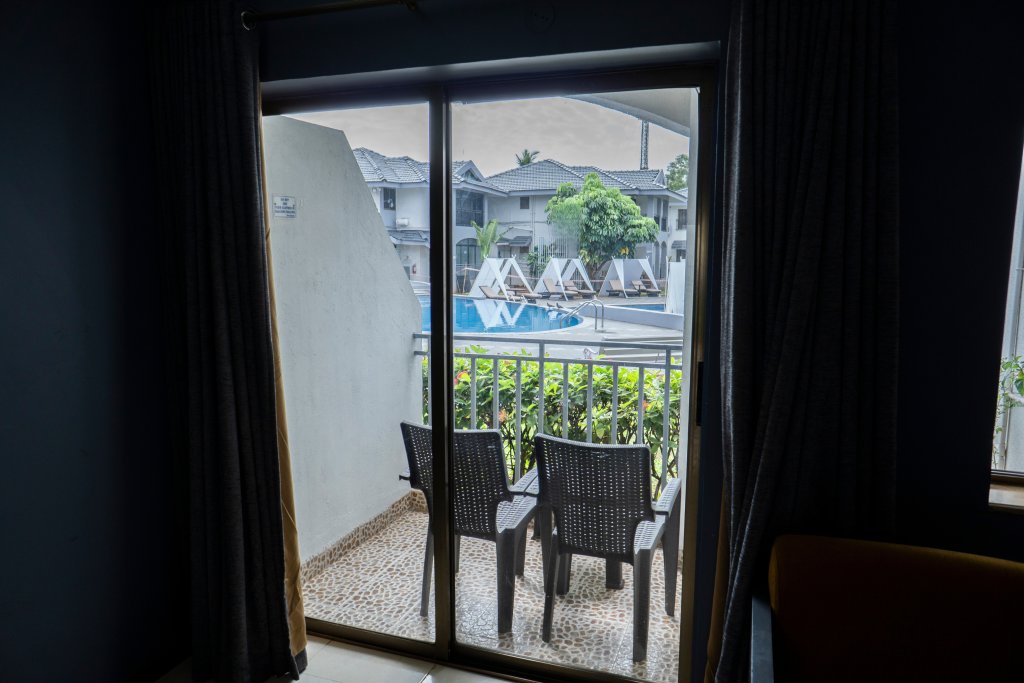 Superior room with balcony and with pool view Baywatch Resort, Colva Goa