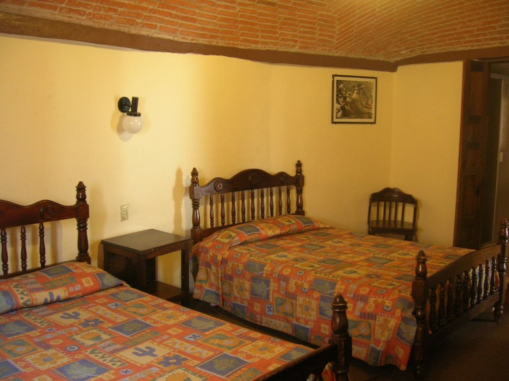 Standard Quadruple room Hotel Molino del Rey