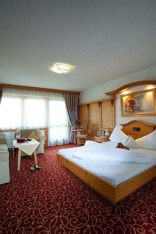 Comfort room 4*S Hotel Alpina in Kössen