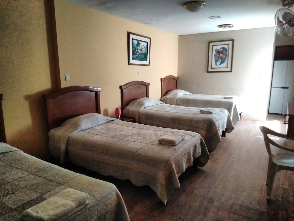 Habitación cuádruple Clásica Hotel Mamatila Lima