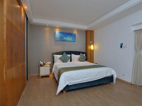 Семейный люкс Deluxe с 2 комнатами с видом на море Sanya Poly Phoenix Hotel