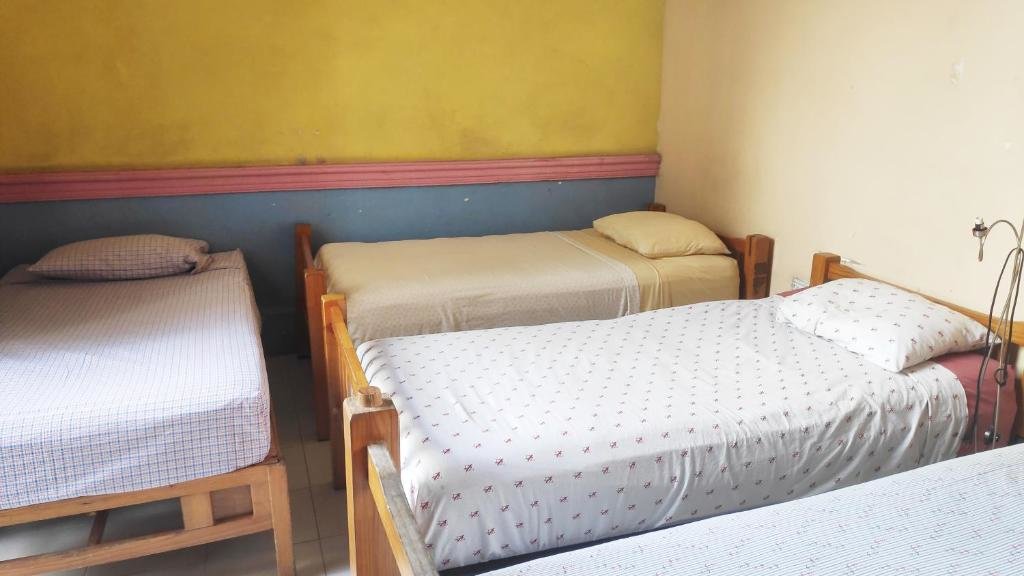 Кровать в общем номере Hostal Zócalo