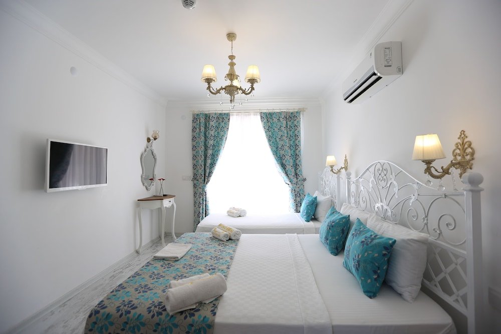 Confort triple chambre Avec vue Rüzgar Gülü Butik Otel