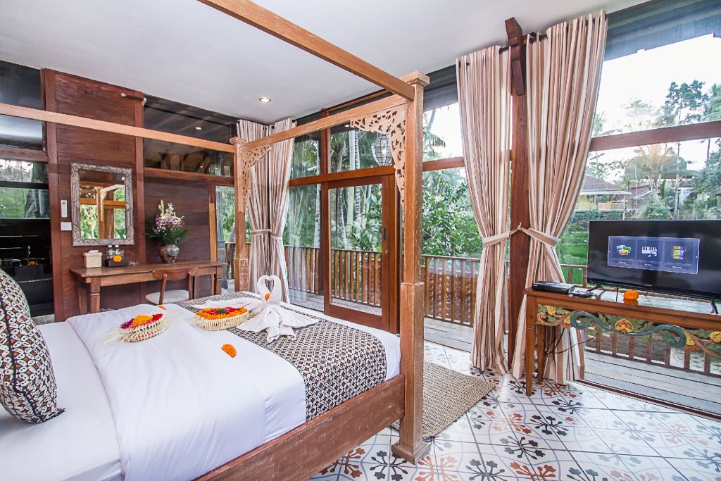 Camera doppia Deluxe 1 camera da letto con balcone e con vista sulla piscina Gusde Tranquil Villas