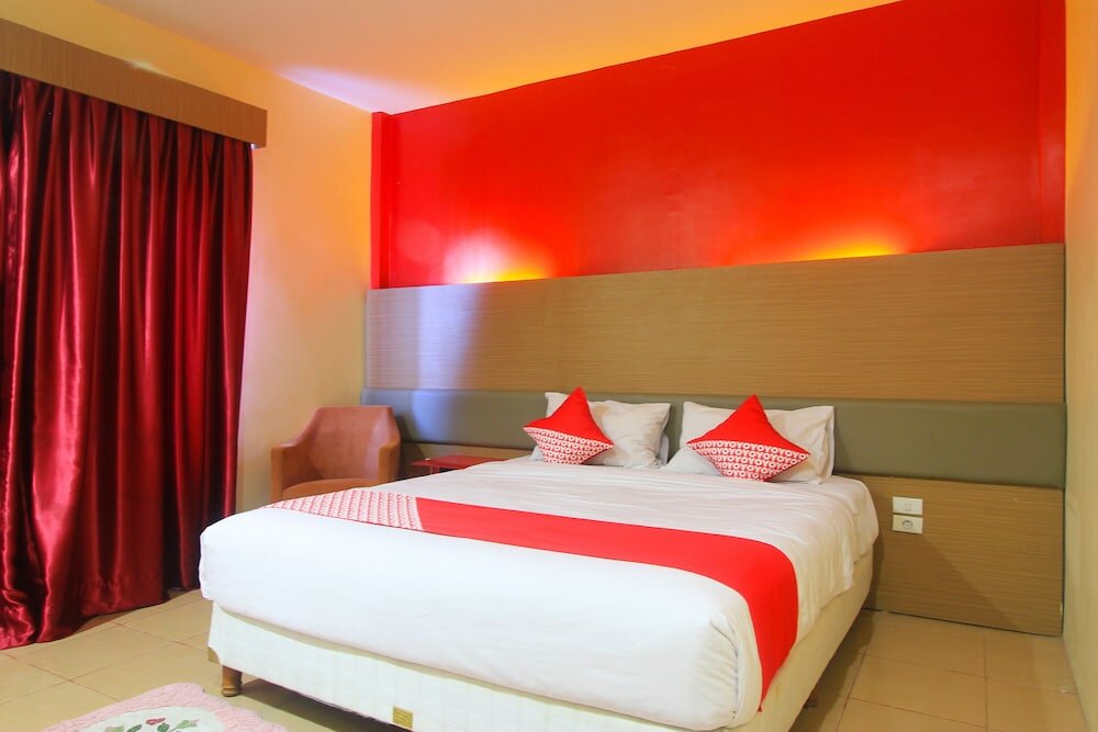 Номер Deluxe OYO 1153 Tiga Dara Hotel & Resort Syariah