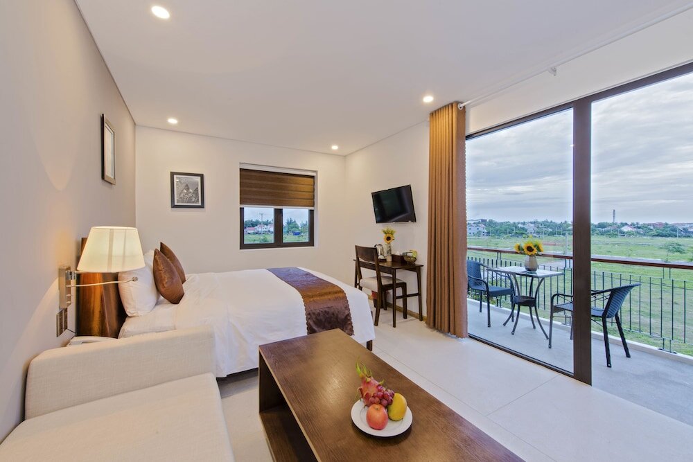Deluxe double chambre avec balcon et Vue sur la rivière Sun Paradise Villa Hoi An