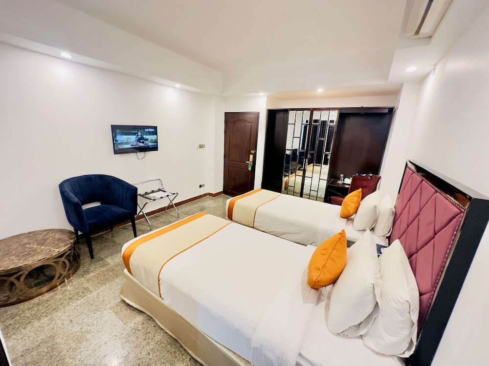 Premium double chambre 1 chambre avec balcon et Vue sur la ville The Elite Residence Dhaka