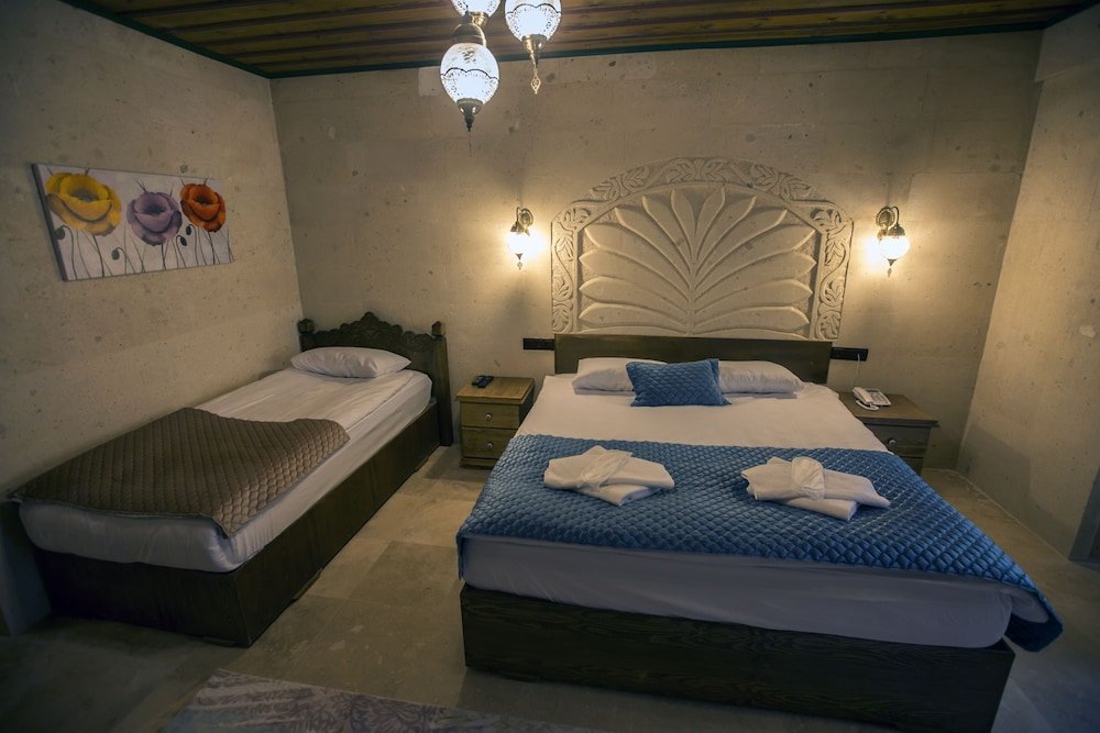 Трёхместный номер с Камином Comfort Cappadocia Elite Stone House