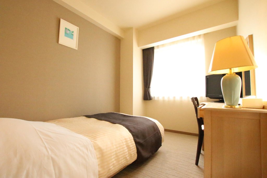 Standard simple chambre Kotoni Green Hotel