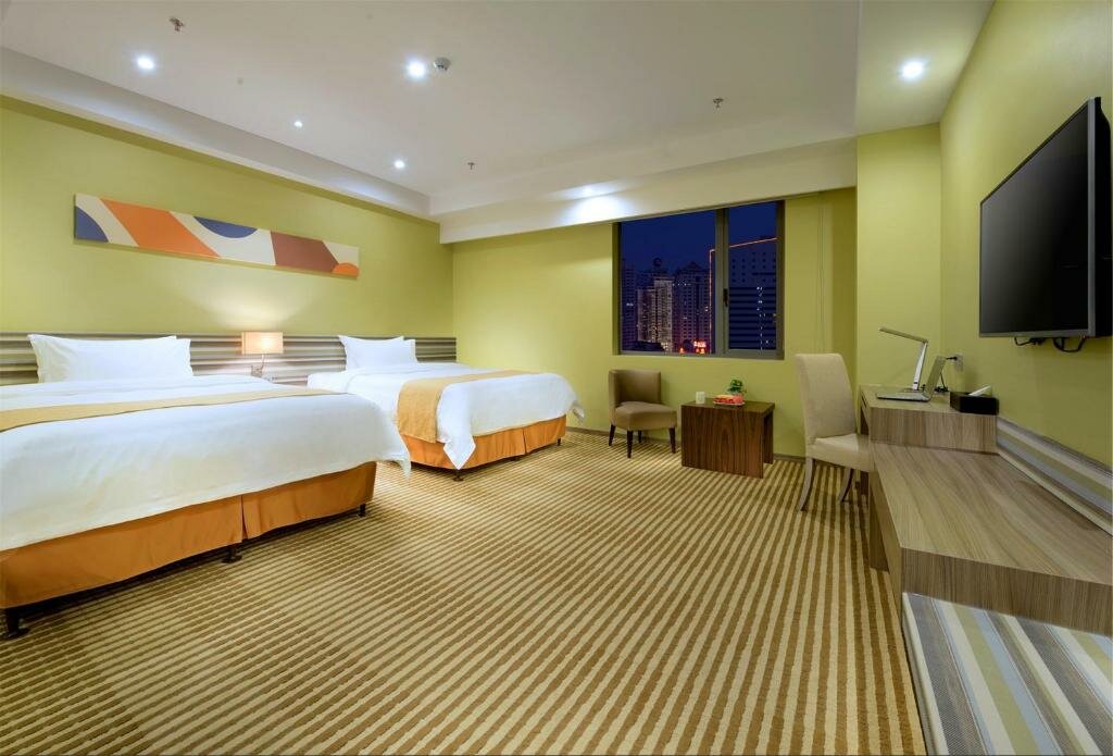 Deluxe room Chinatrust Hotel