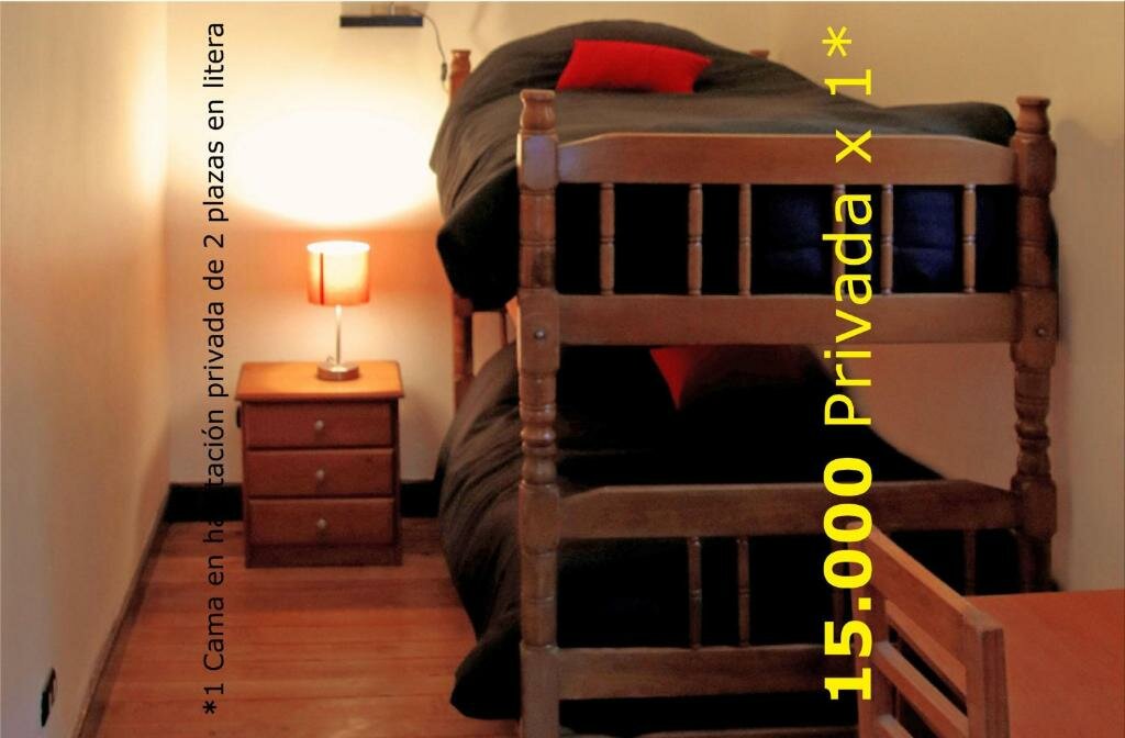 Cama en dormitorio compartido Hostal Irreal