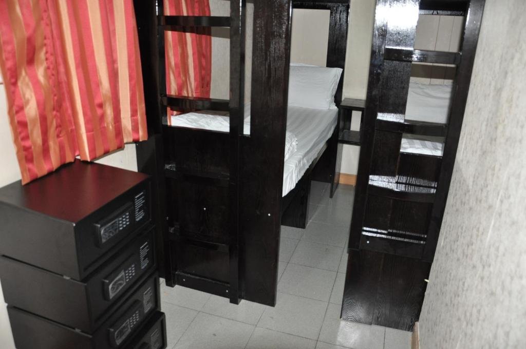 Cama en dormitorio compartido New Guangzhou Guest House