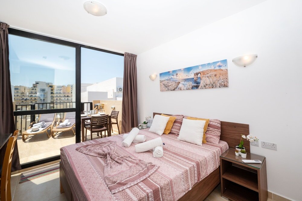 Standard Apartment Sea Bliss Penthouse with two terraces enjoying side seaviews by Gatewaysmalta