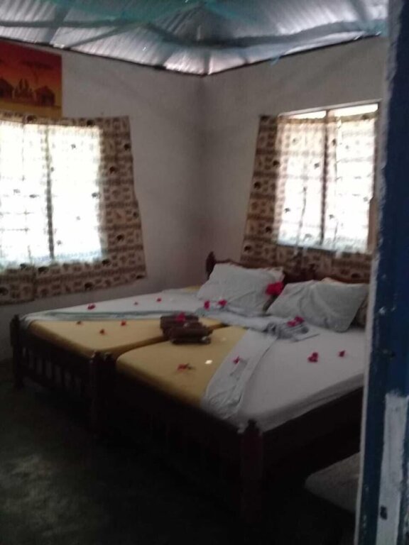 Cama en dormitorio compartido Wasini Dolphin Divers Lodge - Hostel