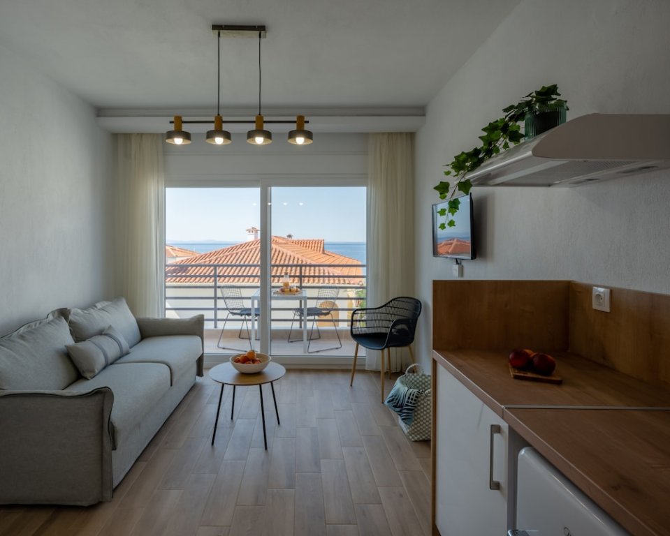 Suite doble sótano con balcón y con vista al mar Aiora Suites by Booking Kottas