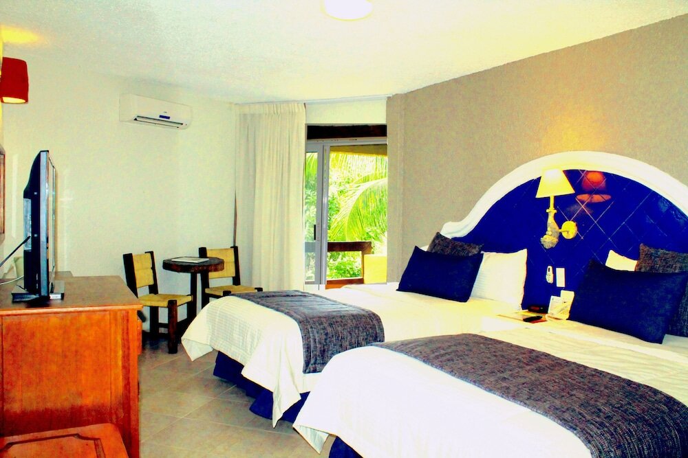 Номер Superior с балконом и с видом на сад Casa del Mar Cozumel Hotel & Dive Resort