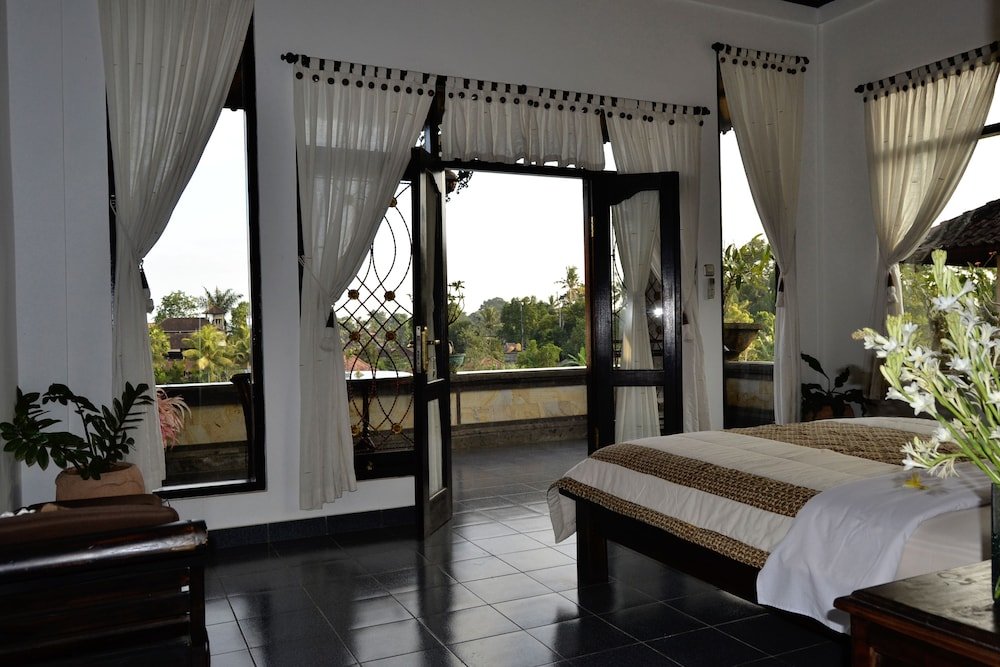 Habitación doble De lujo con balcón Kun - Kun Guest House Ubud