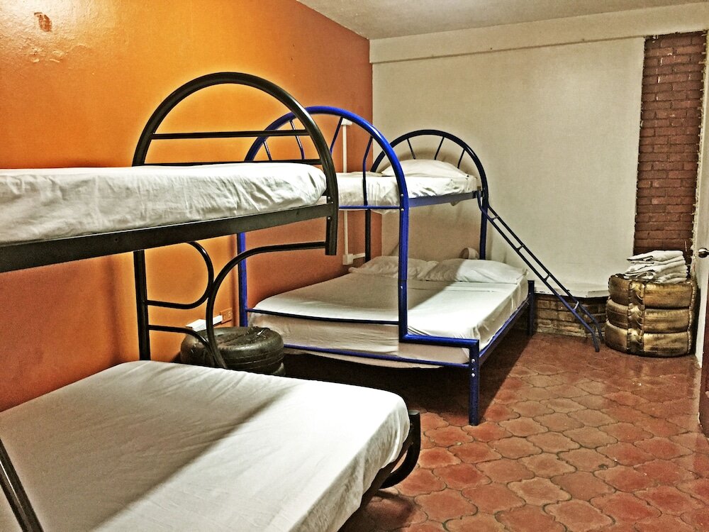 Кровать в общем номере Hostel Trotamundos