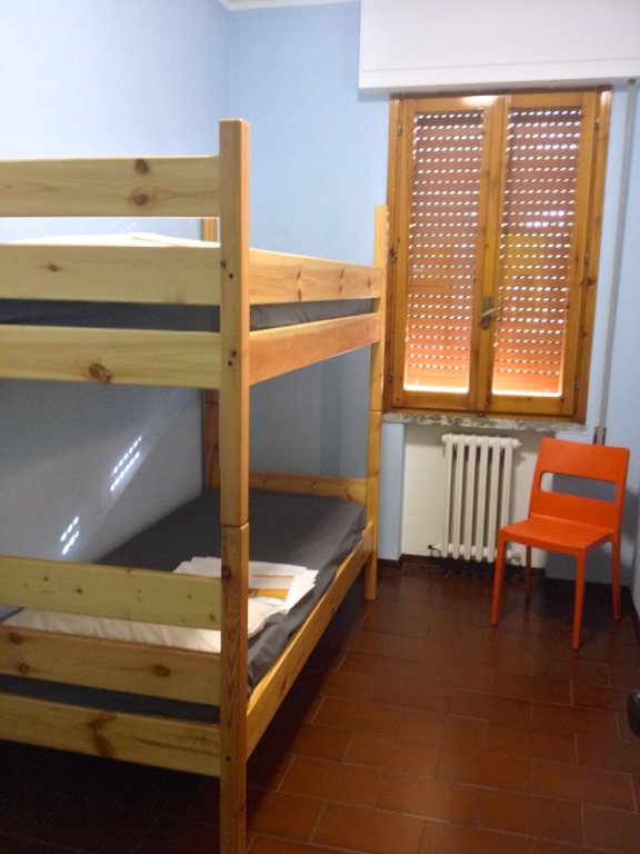 Кровать в общем номере Siena Hostel Guidoriccio