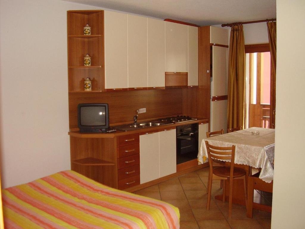 Апартаменты Residence Baia dei Pini