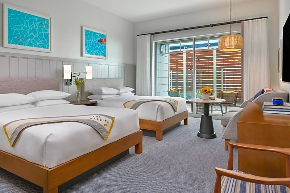 Standard Quadruple room with pool view The Seabird Ocean Resort & Spa, Part of Destination Hotel