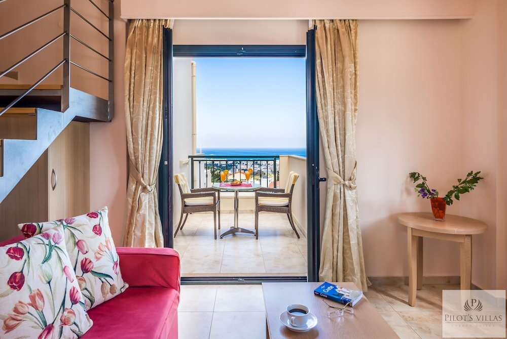 Suite ático con balcón Pilot's Villas Luxury Suites