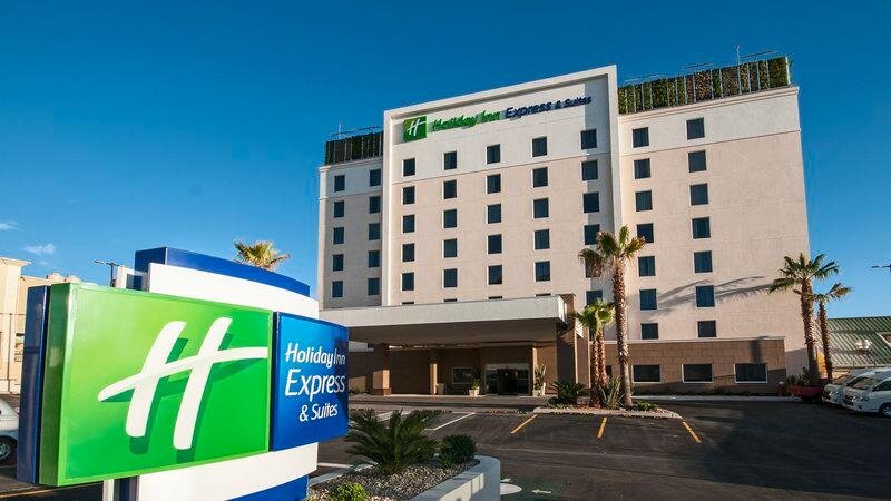 Кровать в общем номере Holiday Inn Express & Suites Chihuahua Juventud, an IHG Hotel