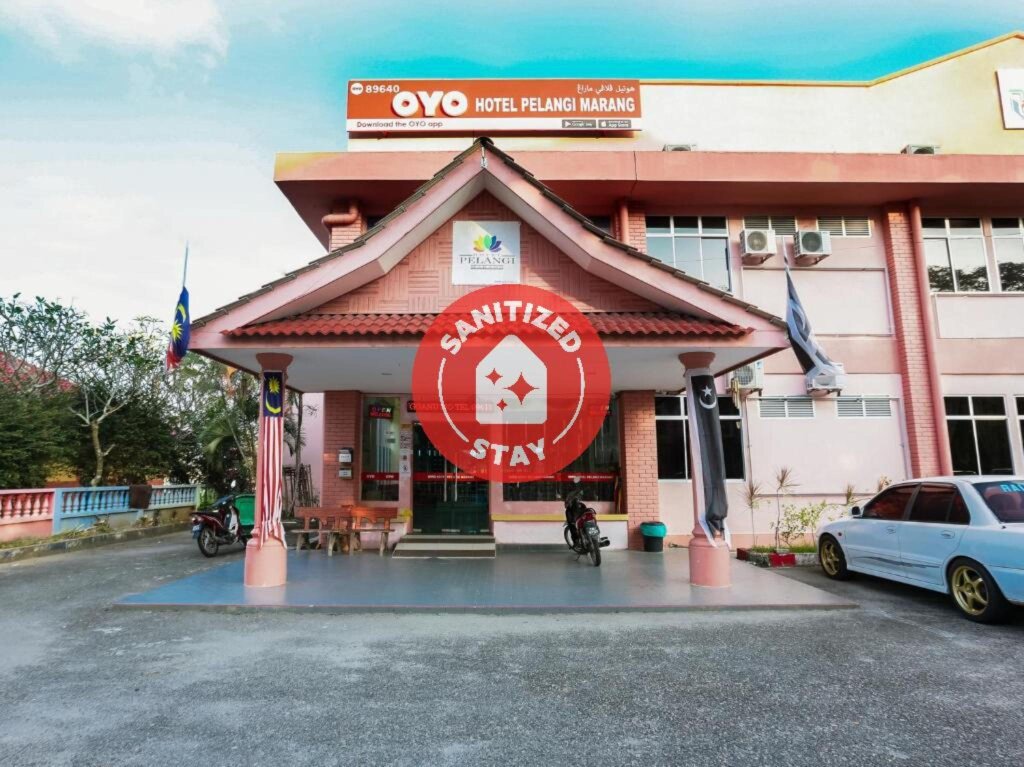 Кровать в общем номере Super OYO 89640 Hotel Pelangi Marang