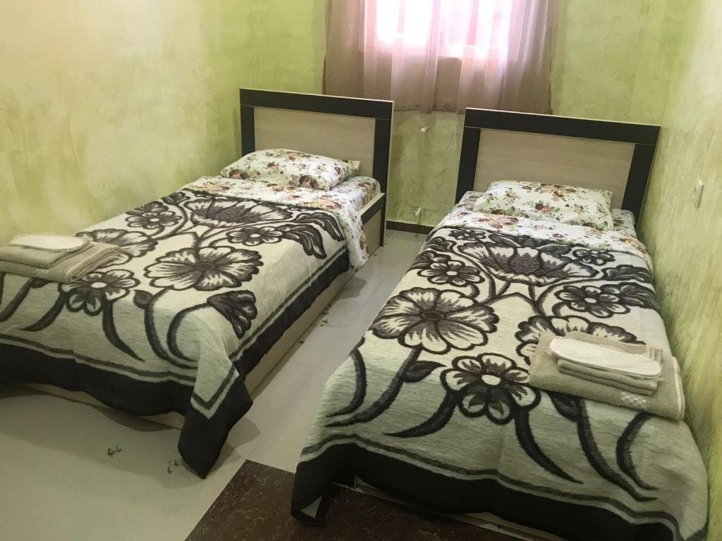 Кровать в общем номере (мужской номер) Отель «Вахтангури»