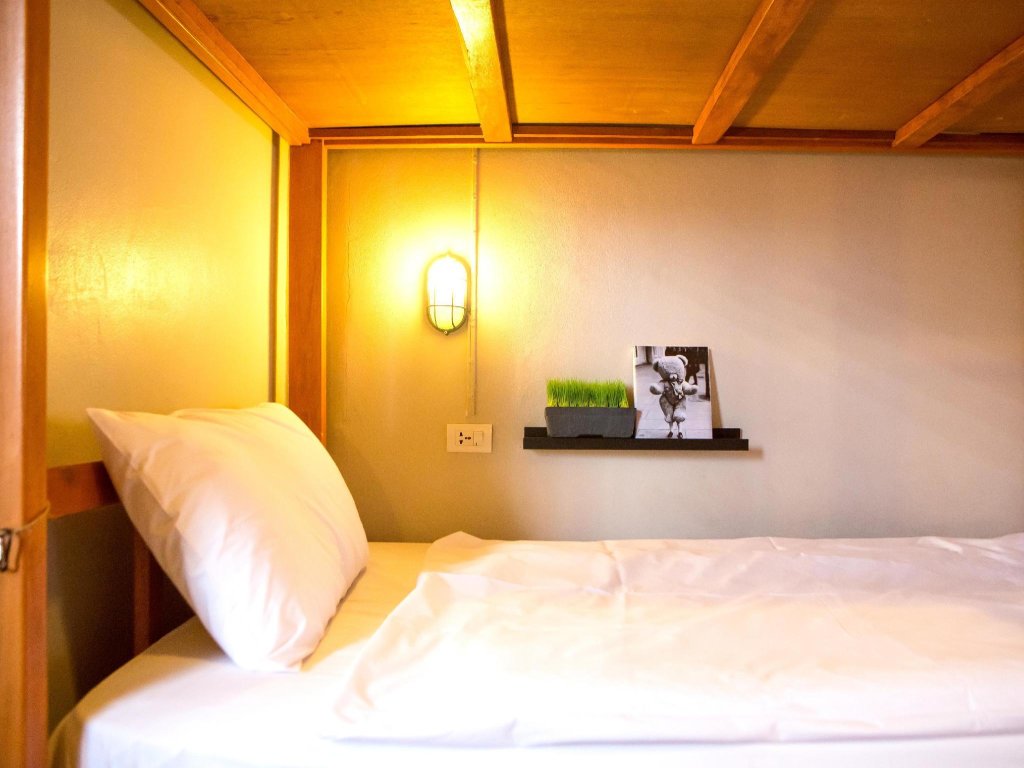 Кровать в общем номере Pak-Up Hostel