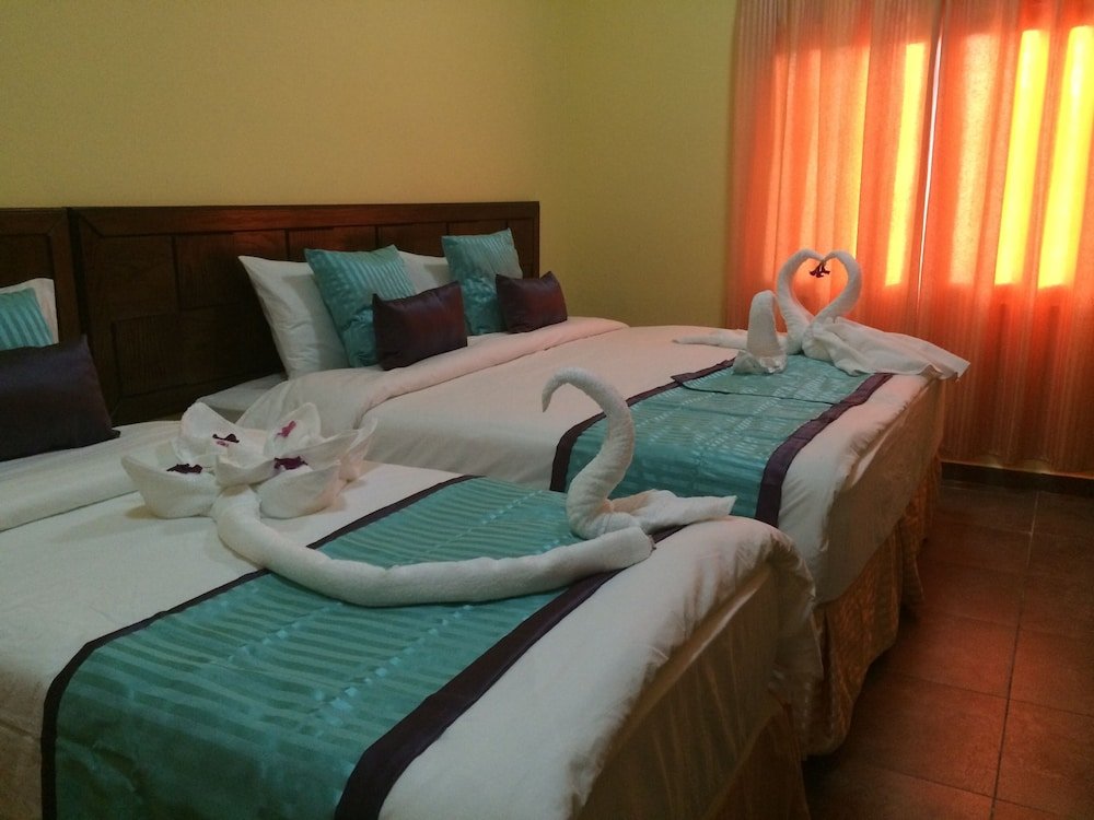 Standard quadruple chambre avec balcon Almarsa Village Dive Resort