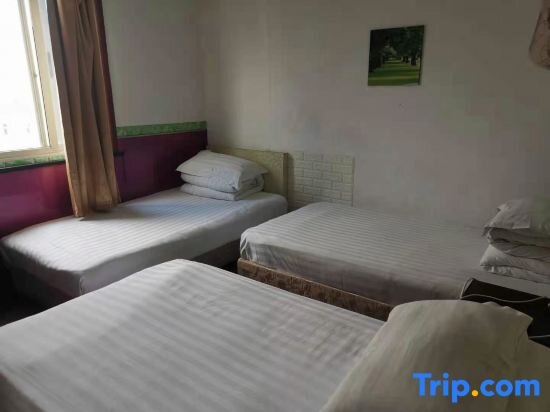 Кровать в общем номере (мужской номер) Jiaojiang Business Hotel